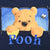 Close-up of Winnie the Pooh and bee front graphic with blue Pooh lettering