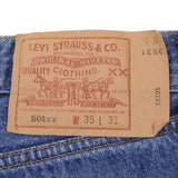 Beautiful Indigo Levis 501 Jeans 1990s Made in USA with Medium Wash  Size on tag 35X31 Actual Size 34X29 Back Button #524