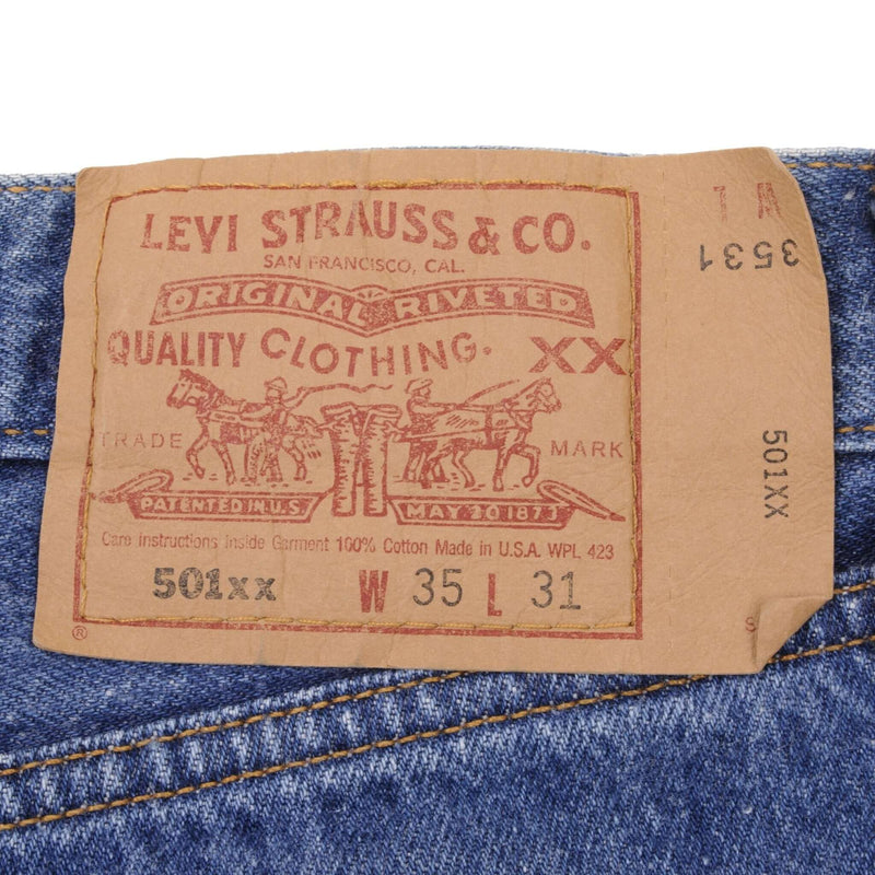 Beautiful Indigo Levis 501 Jeans 1990s Made in USA with Medium Wash  Size on tag 35X31 Actual Size 34X29 Back Button #524