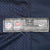 Close-up of NFL Players and Nike lower hem label on navy mesh jersey