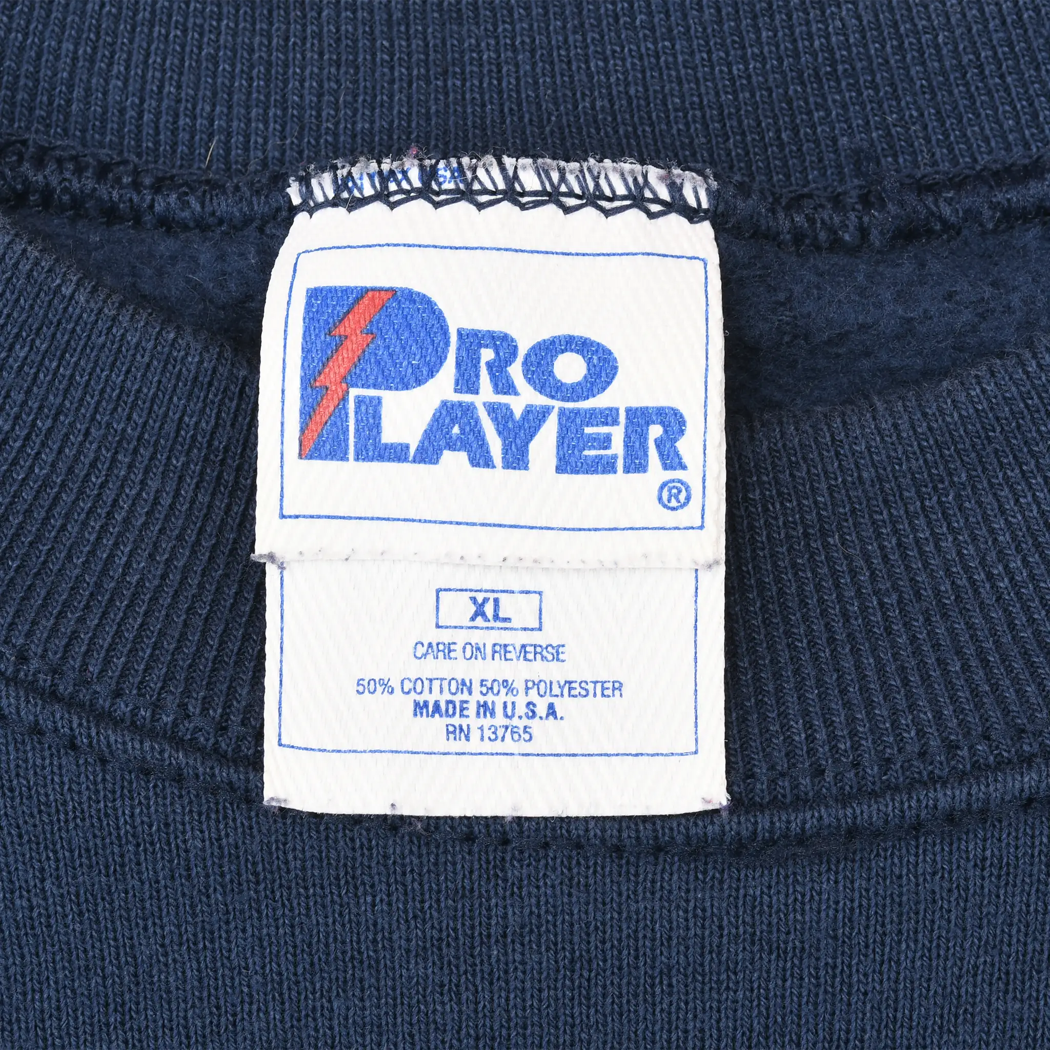 Pro Player neck label marked XL, 50% cotton and 50% polyester, made in USA