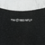 Close-up of 1993 NFLP trademark print beneath the Steelers graphic