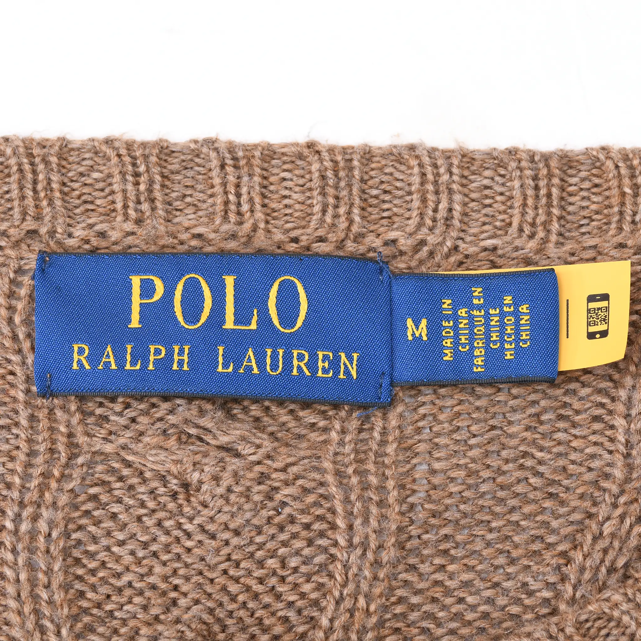 Polo Ralph Lauren neck label and medium size tag inside brown cable-knit sweater