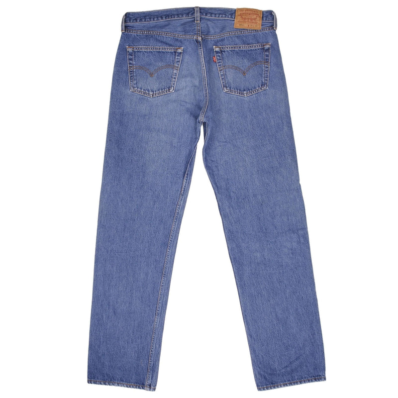 Beautiful Indigo Levis 501 Jeans 1990s Made in USA with Medium Wash  Size on tag 38X36 Actual Size 37X34 Back Button #524