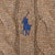 Close-up of blue Polo pony embroidery on brown cable-knit sweater