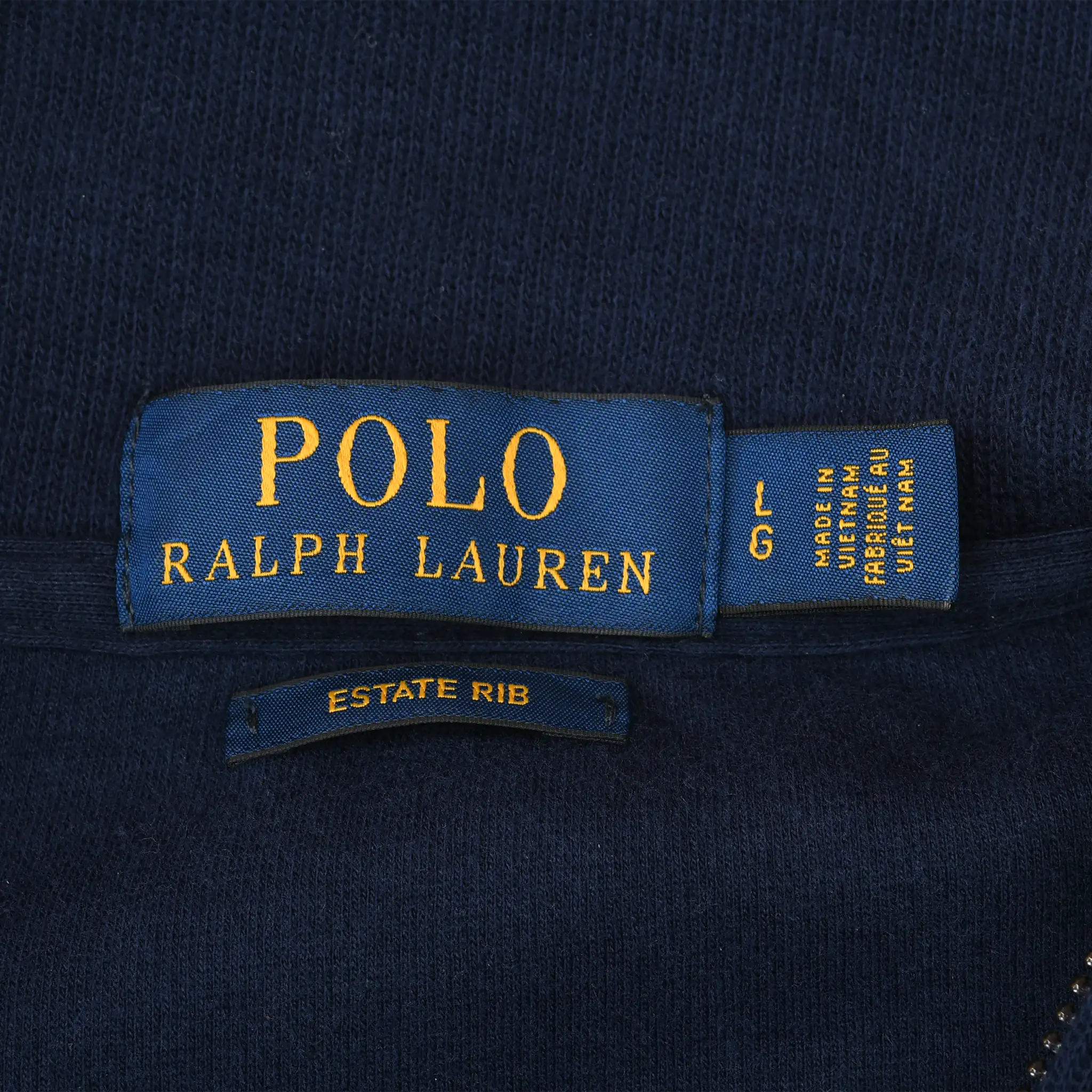 Polo Ralph Lauren large neck label and Estate Rib tag inside navy sweater