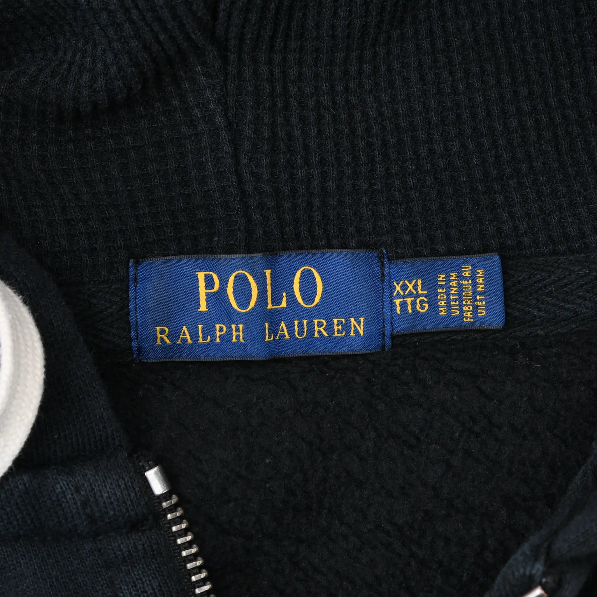 Polo Ralph Lauren neck label and XXL size tag inside black hoodie