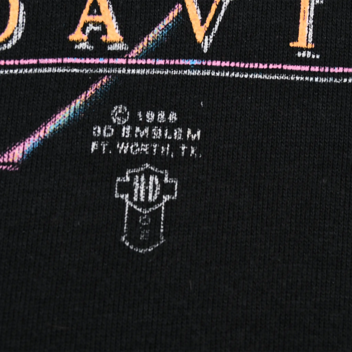 Close-up of the 1986 3D Emblem copyright mark beneath the Harley-Davidson print
