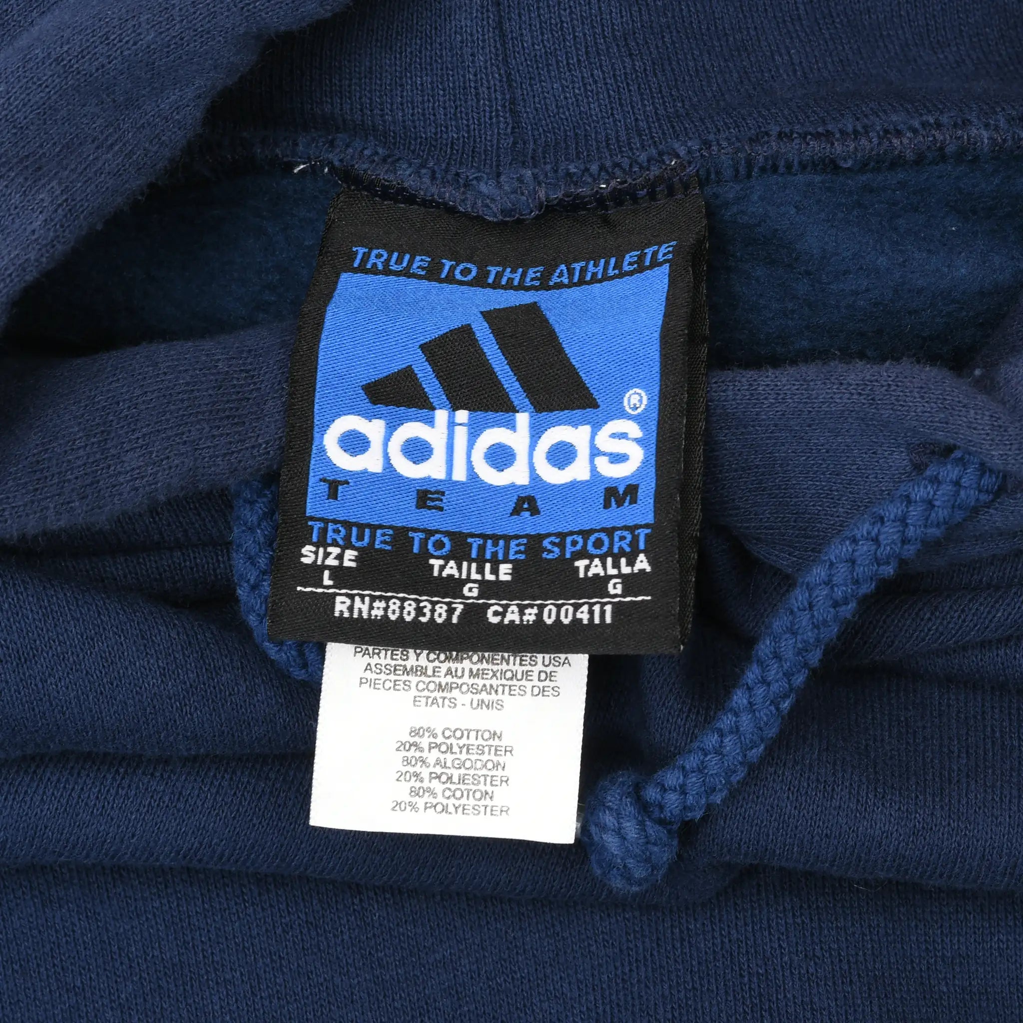 Adidas Equipment neck tag and care label inside navy blue hoodie