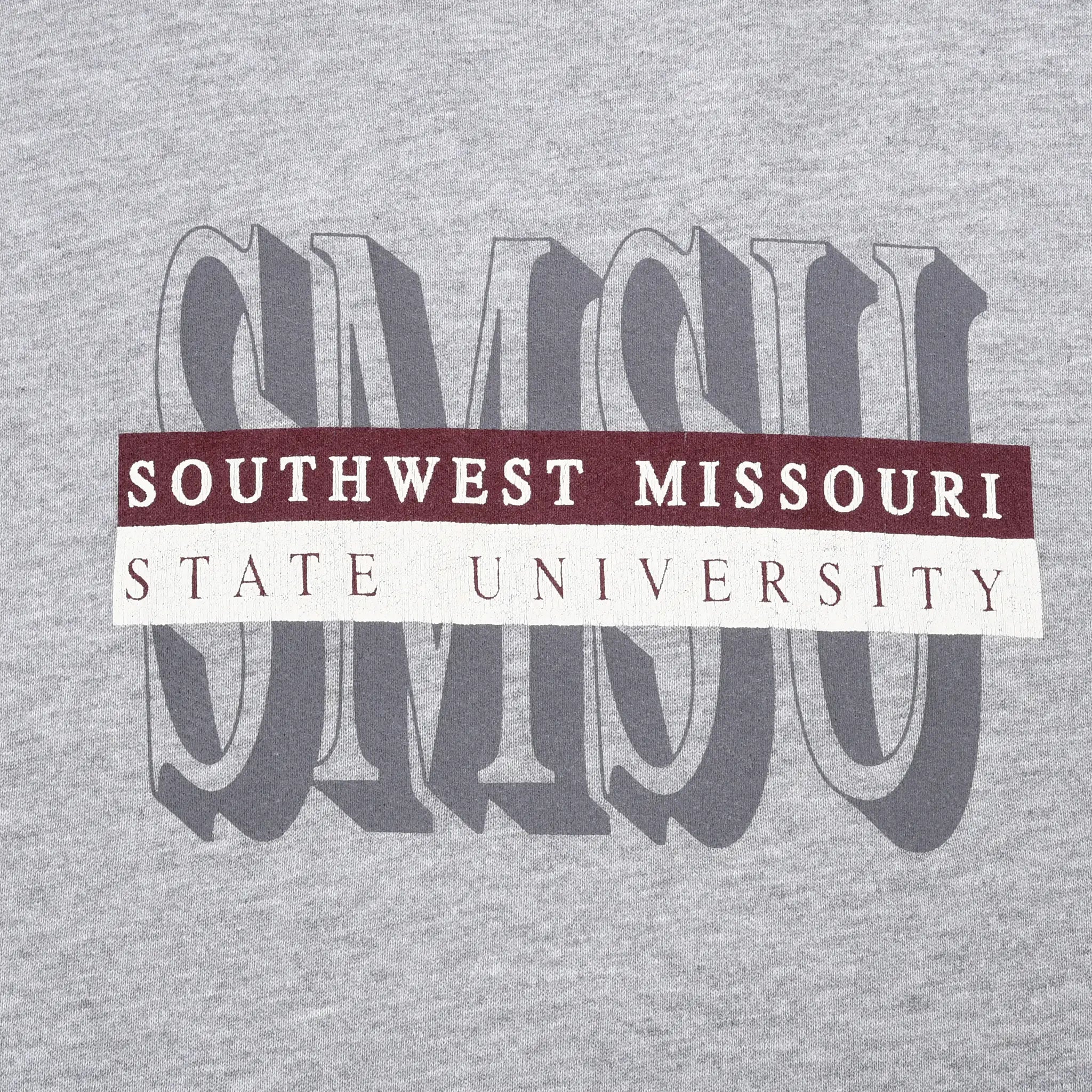 Close-up of maroon and gray Southwest Missouri State University front graphic