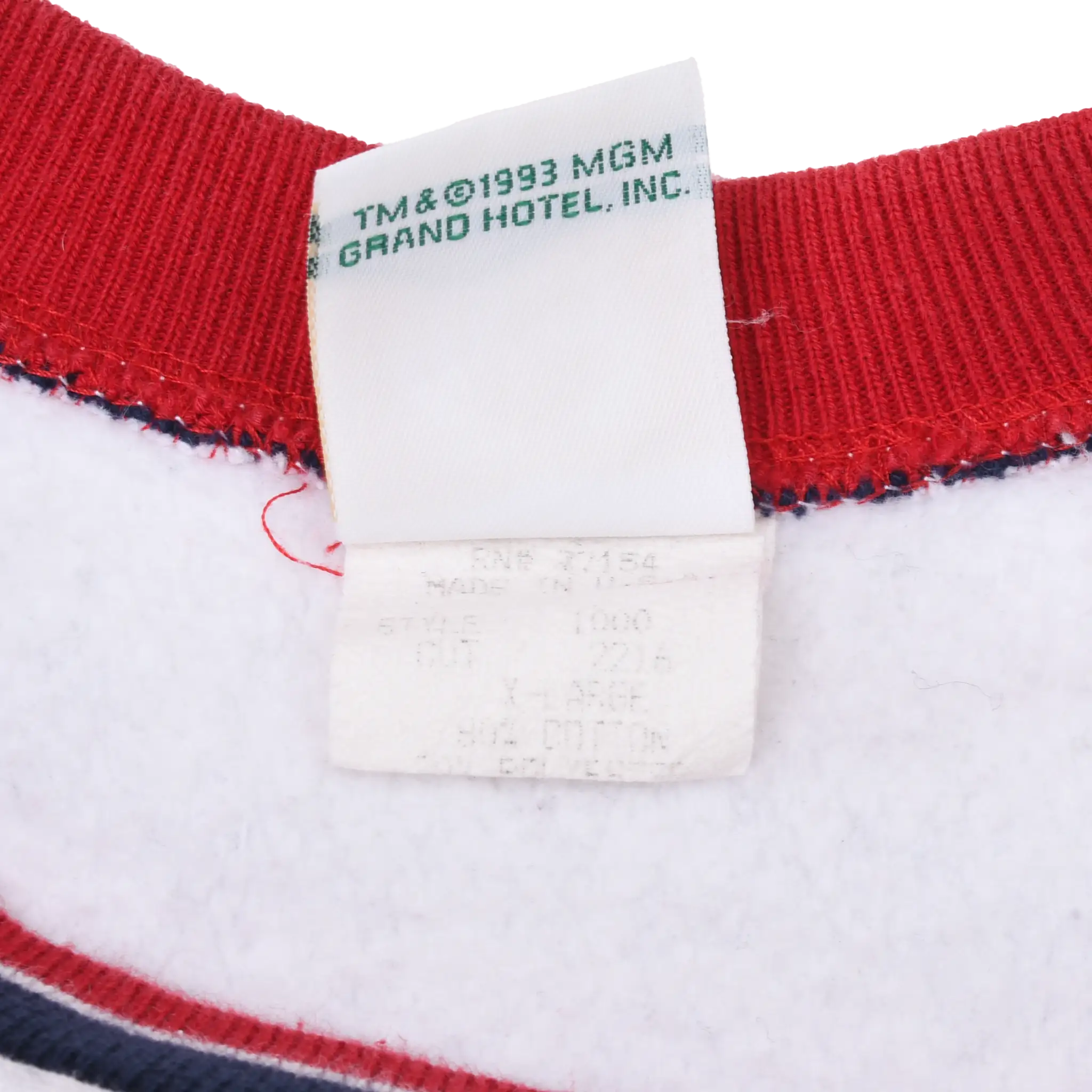 Neck tag detail with ©1993 MGM Grand Hotel, Inc. text and faded care label