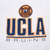 Close-up of UCLA Bruins bear mascot and navy-and-gold chest graphic