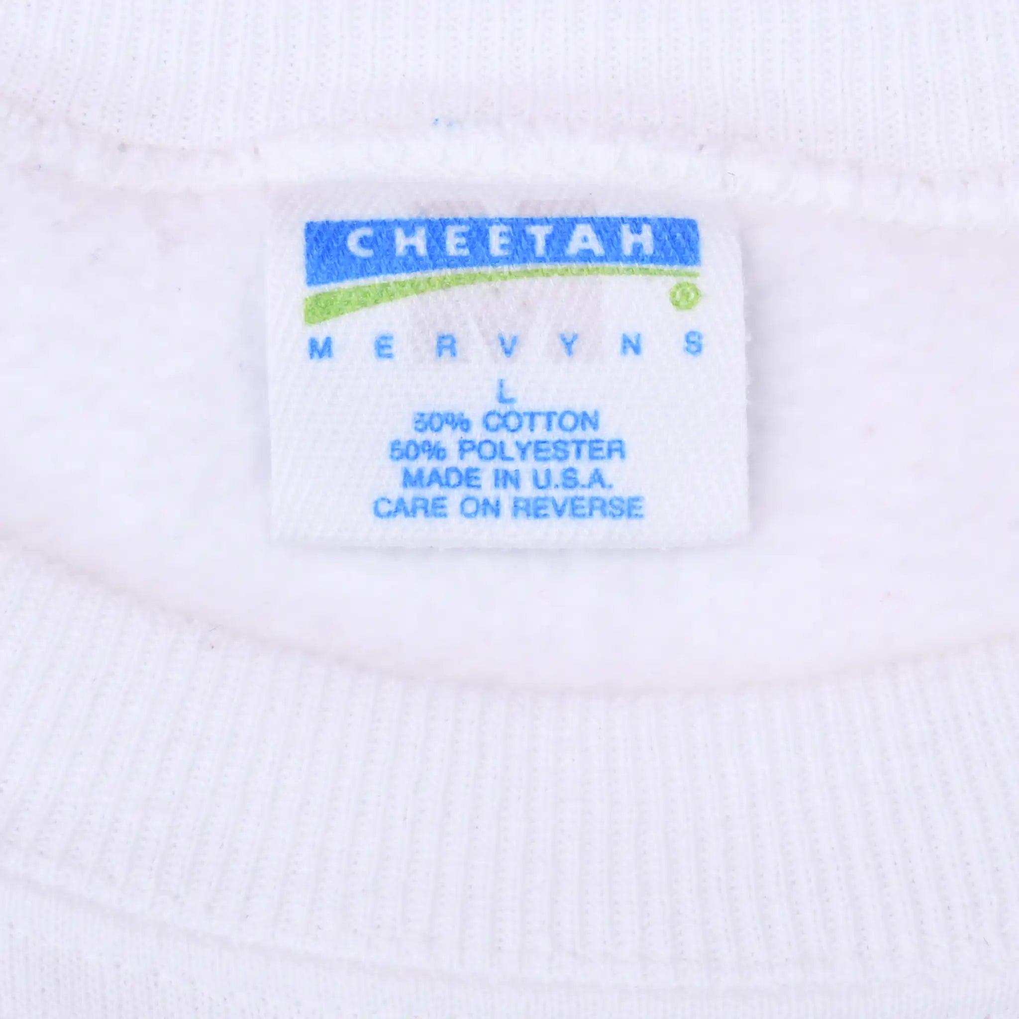 Cheetah by Mervyns large neck label with cotton-polyester blend and Made in USA text