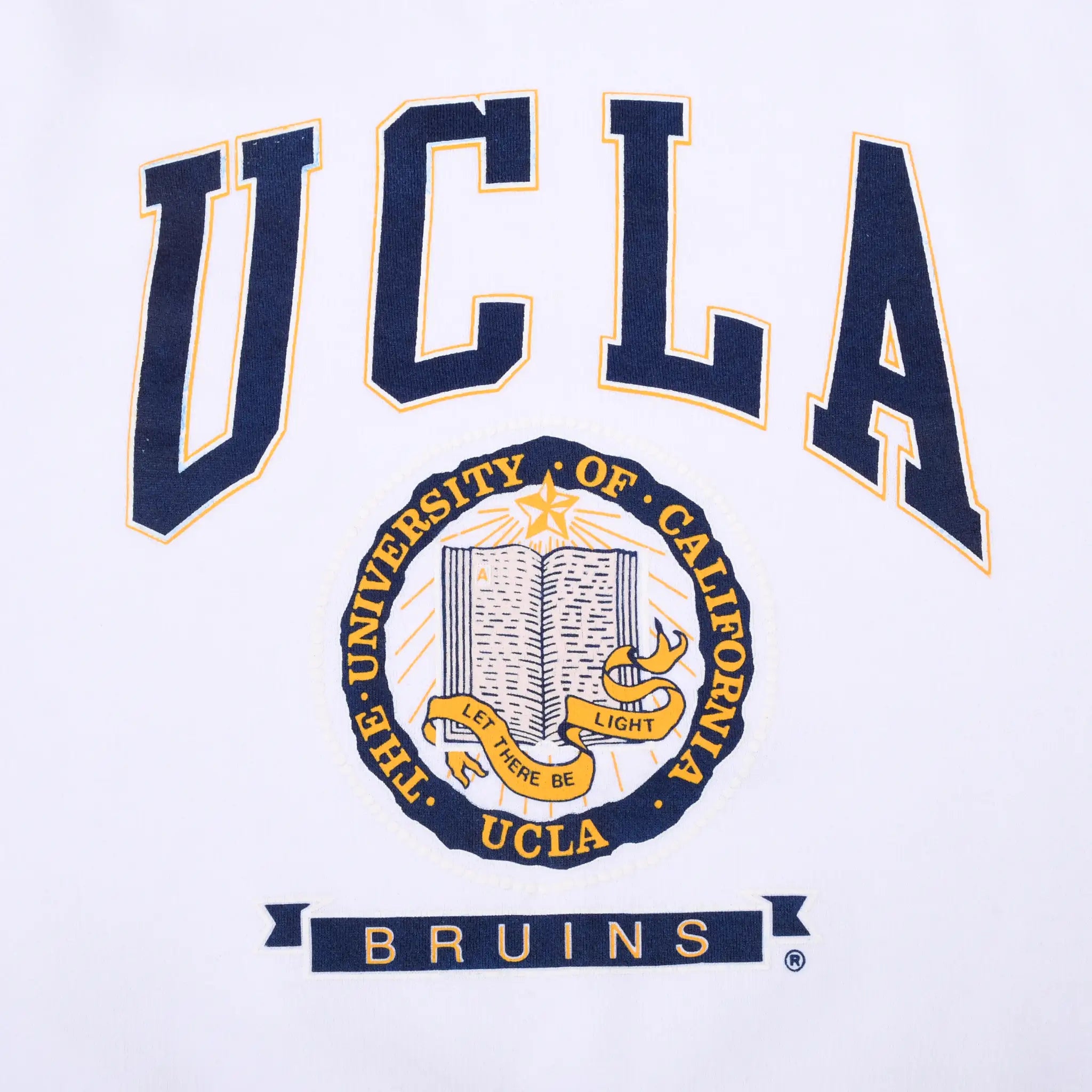 Close-up of navy and gold UCLA Bruins lettering and University of California seal graphic