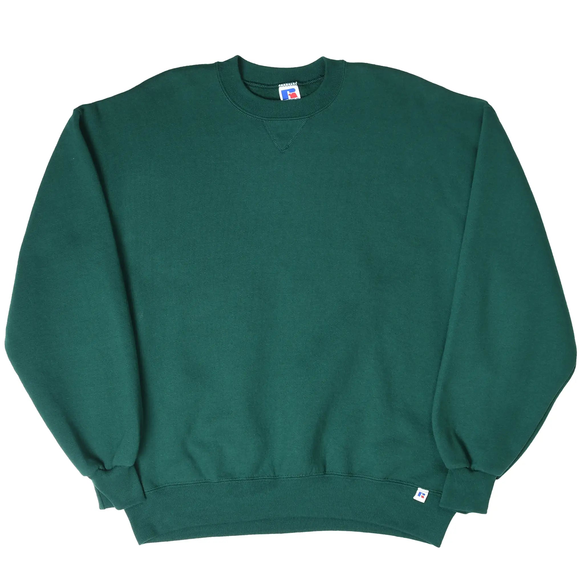 Full front view of pine green Russell Athletic sweatshirt with ribbed cuffs and hem