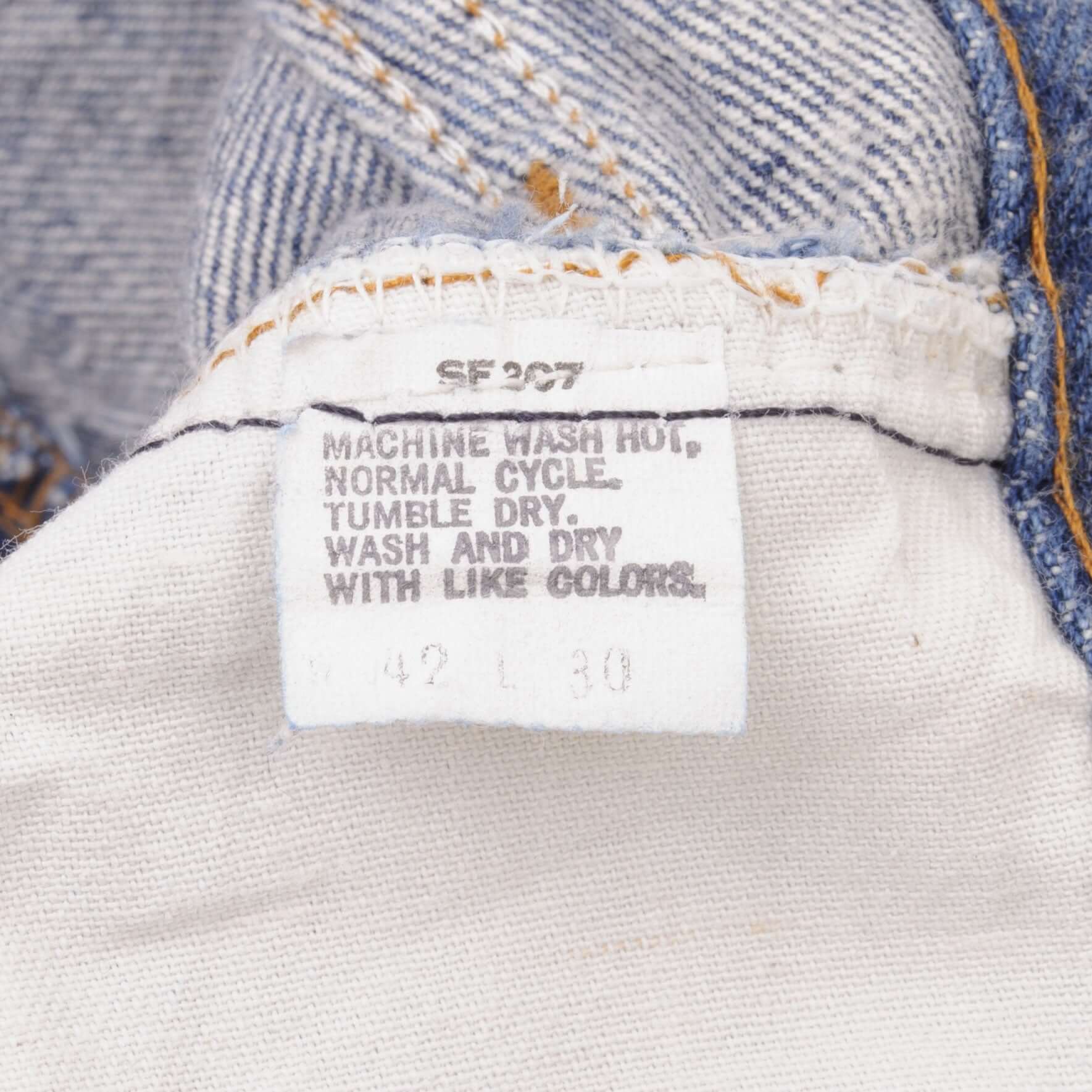 Beautiful Indigo Levis 501 Jeans 1980s Made in USA with Dark Wash  Size on tag 42X30 Actual Size 42X30  Back Button #524