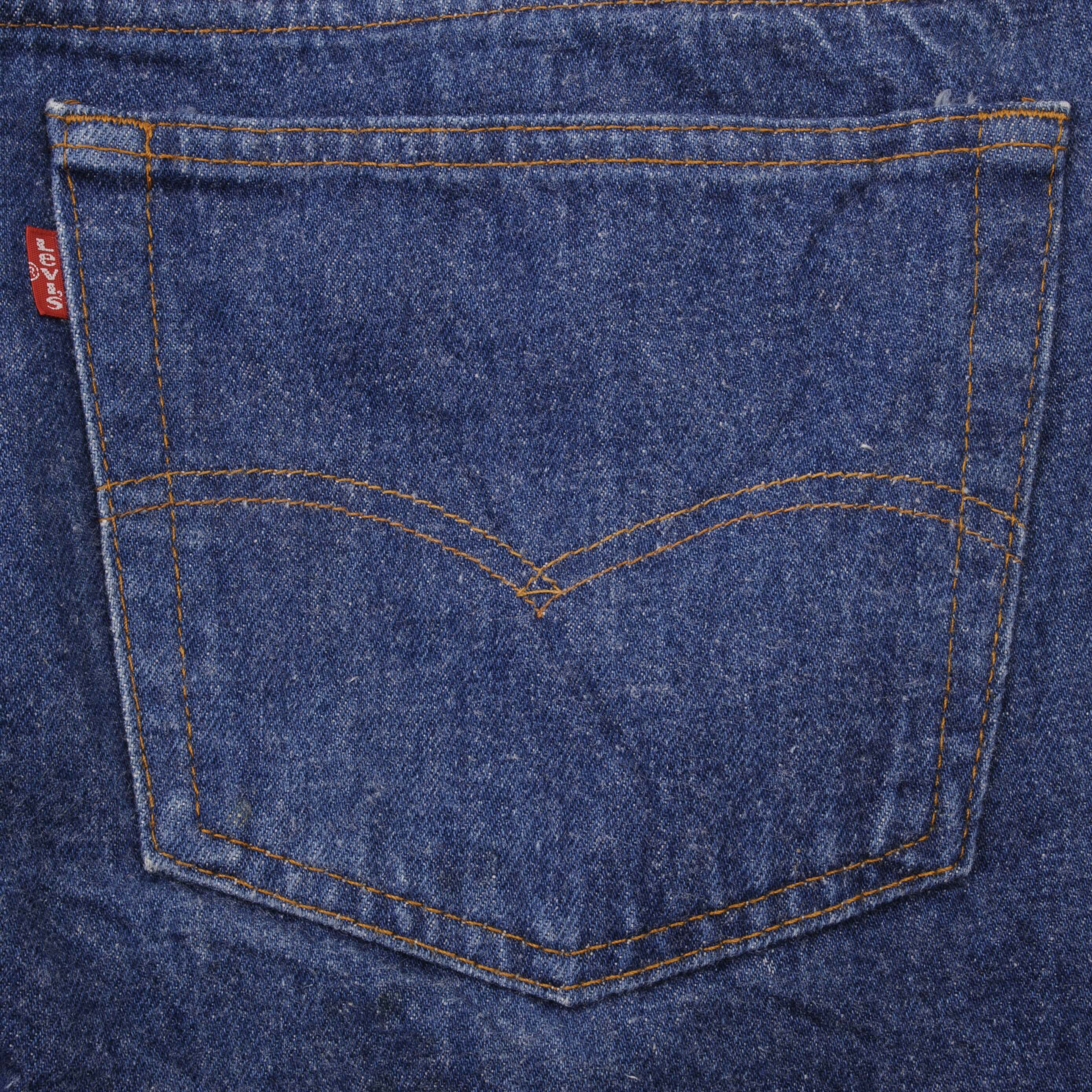 Beautiful Indigo Levis 501 Jeans 1980s Made in USA with Dark Wash  Size on tag 42X30 Actual Size 42X30  Back Button #524