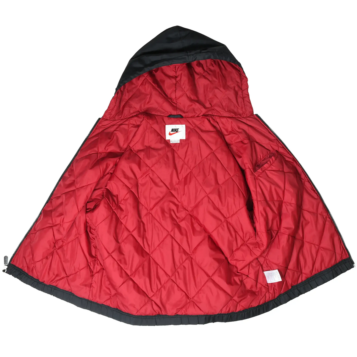 Open Nike windbreaker showing red diamond-quilted lining and lined hood