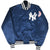 Front of navy New York Yankees Starter bomber jacket with striped ribbed trim