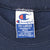Champion XX-Large neck tag inside navy sweatshirt