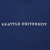 Close-up of white Seattle University lettering on navy sweatshirt