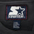 Close-up of Starter neck label and X-Large care tag inside sweatshirt
