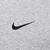 Close-up of black Nike Swoosh embroidery on grey fabric