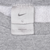 Close-up of Nike neck tag marked size large and Made in USA