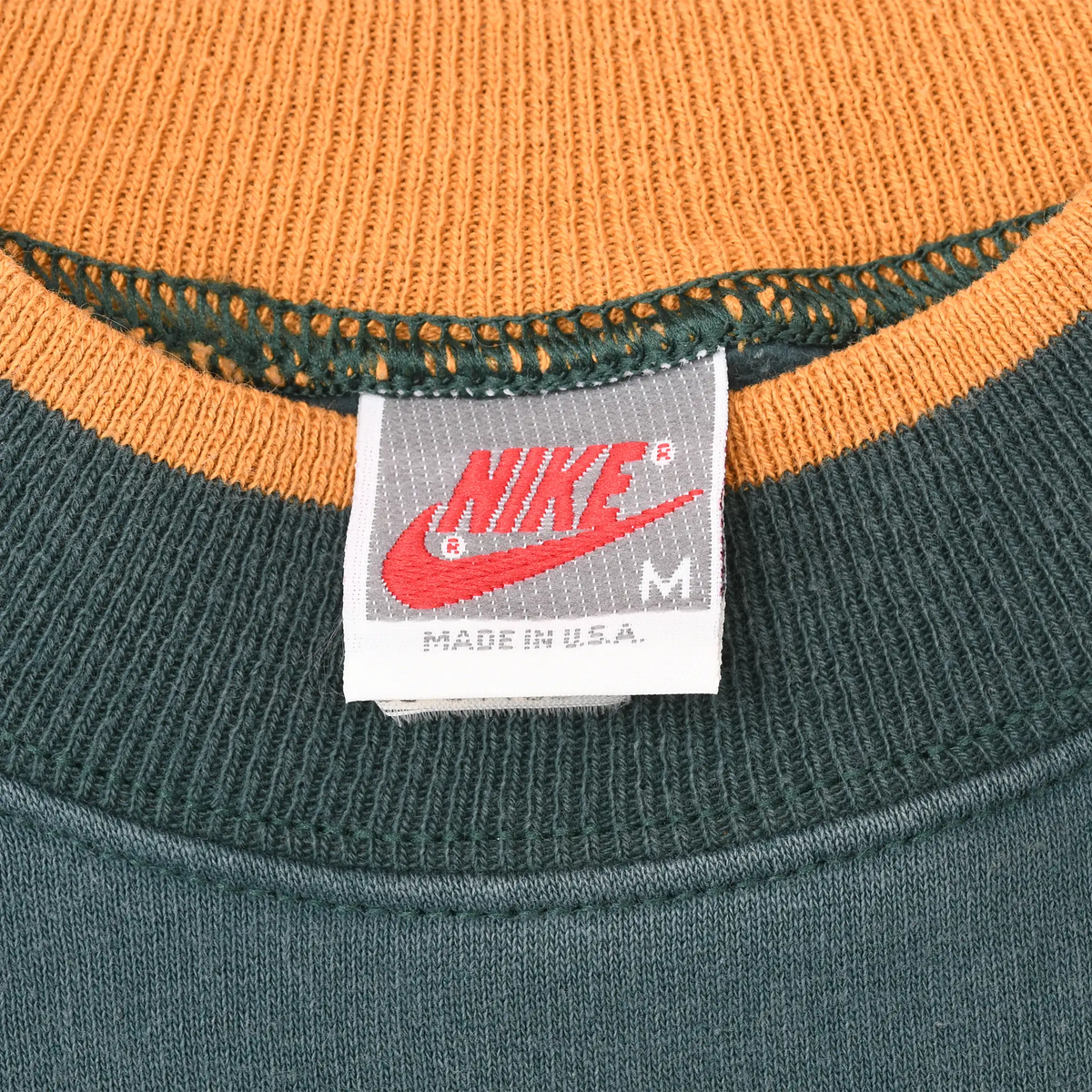 Nike medium Made in USA neck label and orange-striped crewneck detail
