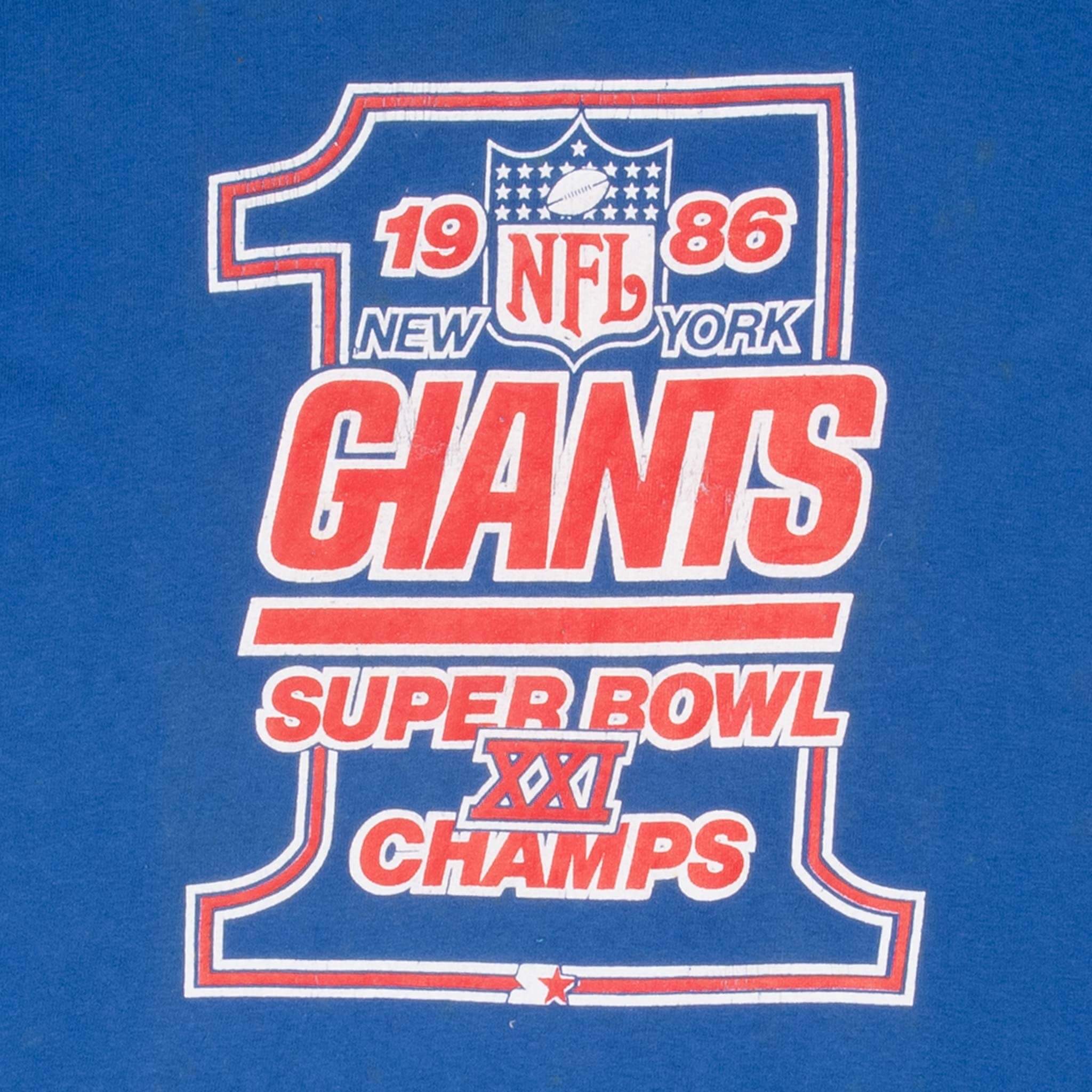 Vintage NFL New York Giants World Champs 1986 Blue Tee Shirt Size Large Made In USA With Single Stitch Sleeves