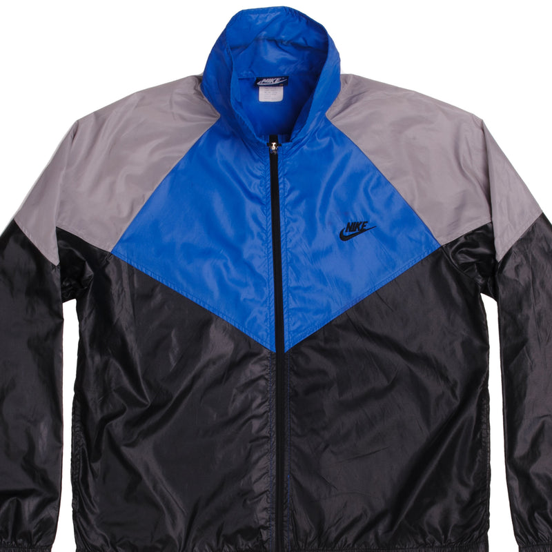 Vintage Nike Blue And Black Shell Jacket From 1984-1987 Jacket Size Medium. Nike Blue Label