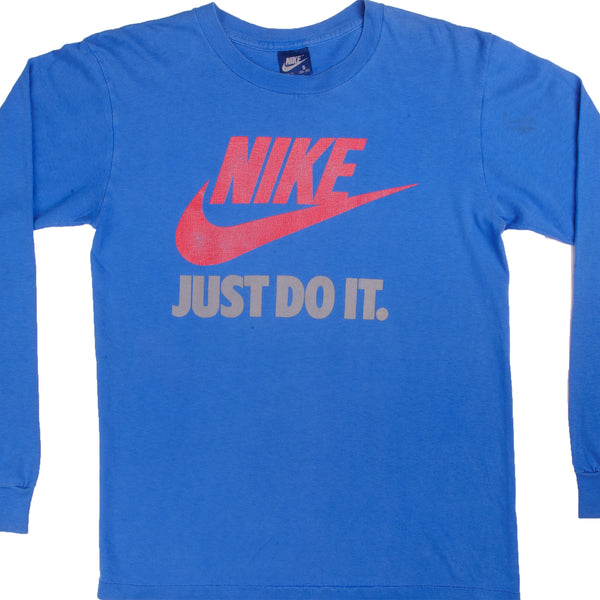 Vintage Blue Nike Just Do It Long Sleeve Tee Shirt 1984-1987 Size S. Made In USA. With Single Stitch.Vintage Blue Nike Just Do It Long Sleeve Tee Shirt 1984-1987 Size S. Made In USA. With Single Stitch. Nike Blue Label