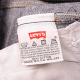Beautiful Indigo Levis 501 Jeans 1990s Made in USA with a very dark wash.  Size on Tag 40X34  ACTUAL SIZE 38X32  Back Button #552