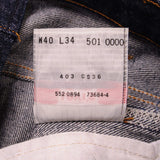 Beautiful Indigo Levis 501 Jeans 1990s Made in USA with a very dark wash.  Size on Tag 40X34  ACTUAL SIZE 38X32  Back Button #552