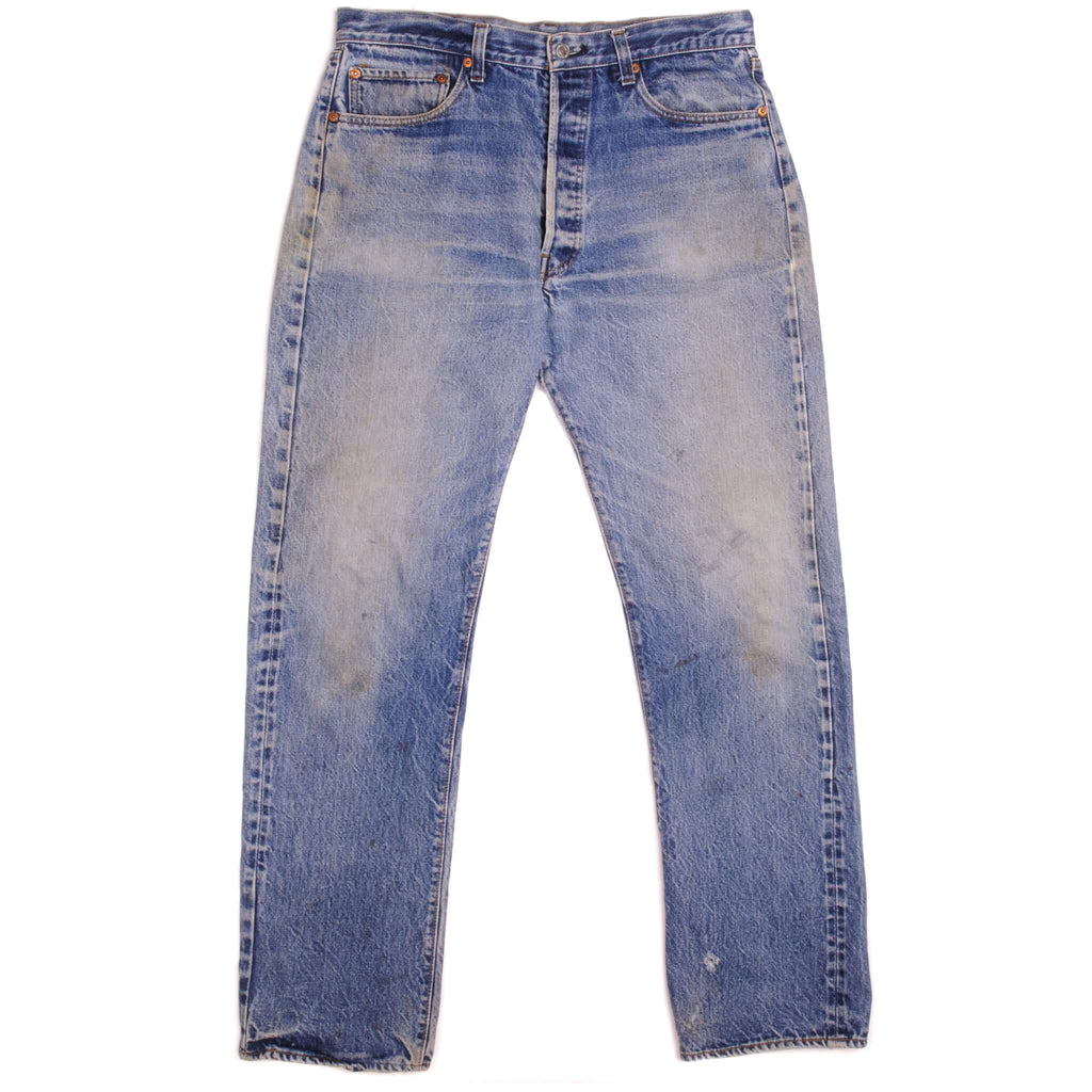 Beautiful Indigo Levis 501 Jeans before mid 1980's with Selvedge Made in USA with a medium blue wash, a nice contrast of light and medium blue and some light Whiskers.  Size on Tag 36X?  ACTUAL SIZE 34X31  Back Button #?