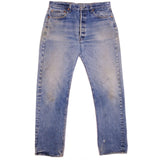 Beautiful Indigo Levis 501 Jeans before mid 1980's with Selvedge Made in USA with a medium blue wash, a nice contrast of light and medium blue and some light Whiskers.  Size on Tag 36X?  ACTUAL SIZE 34X31  Back Button #?