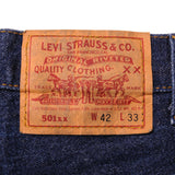 Beautiful Indigo Levis 501 Jeans 1988-1993 Made in USA with a very dark wash.  Size on Tag 42X33  ACTUAL SIZE 40X30  Back Button #532