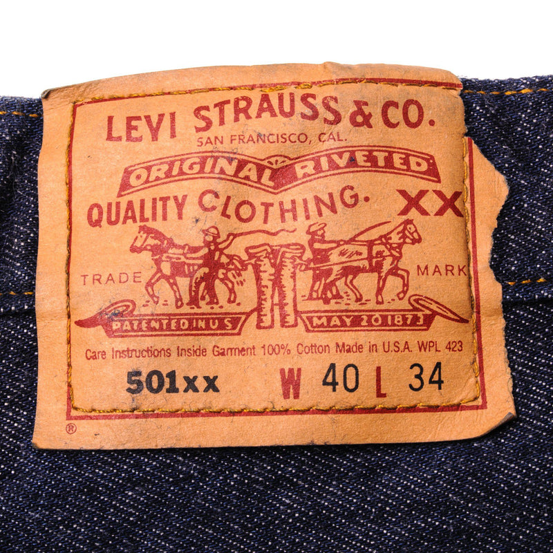Beautiful Indigo Levis 501 Jeans 1990s Made in USA with a very dark wash.  Size on Tag 40X34  ACTUAL SIZE 38X31  Back Button #u53