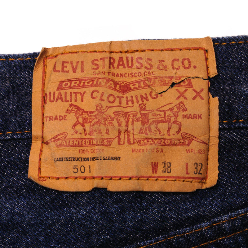 Beautiful Indigo Levis 501 Jeans Early 1980s Made in USA with a dark wash and some nice contrast between dark and medium wash.  Size on Tag 38X32  ACTUAL SIZE 35X28  Back Button No Number