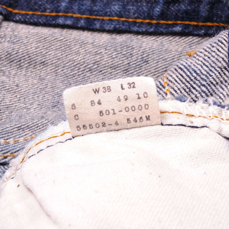 Beautiful Indigo Levis 501 Jeans Early 1980s Made in USA with a dark wash and some nice contrast between dark and medium wash.  Size on Tag 38X32  ACTUAL SIZE 35X28  Back Button No Number