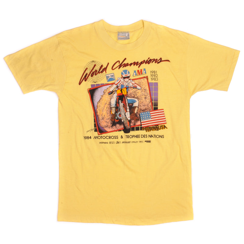 Vintage American Motorcyclist Association World Champions Motocross & Trophee Des Nations Skimmer Tee Shirt 1984 Size Medium Made In USA with single stitch sleeves.