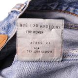 Beautiful Indigo Levis 501 Jeans 1990s Made in USA with a light blue wash and some nice light whiskers.  Size on Tag 28X30  ACTUAL SIZE 26X29  Back Button #553