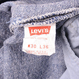 Beautiful Indigo Levis 501 Jeans 1988-1993 Made in USA with a dark blue wash.  Size on Tag 30X36  ACTUAL SIZE 29X35  Back Button #520
