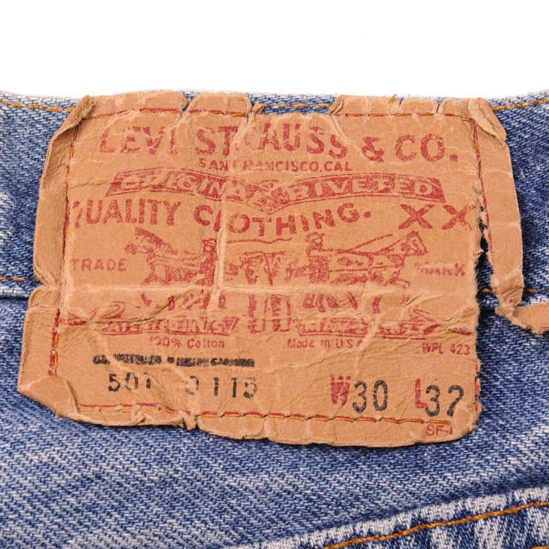 Beautiful Indigo Levis 501 Jeans 1985-1988 Made in USA with a medium blue wash and a nice contrast of light and medium blue and some nice whiskers.  Size on Tag 30X32  ACTUAL SIZE 30X30  Back Button #524
