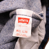 Beautiful Indigo Levis 501 Jeans 1988-1993 Made in USA with a dark blue wash and some nice whiskers.  Size on Tag 31X36  ACTUAL SIZE 30X32  Back Button #552