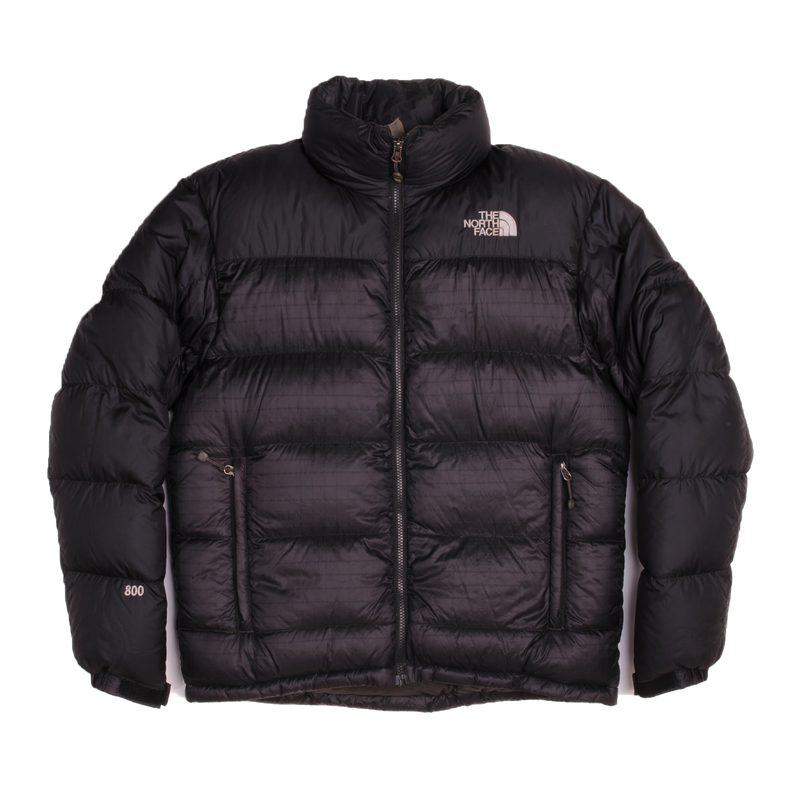 The moment you see the oversized baffles you know you're looking at the iconic Nuptse Jacket. This durable piece has lofty 800-fill down and a sleek.