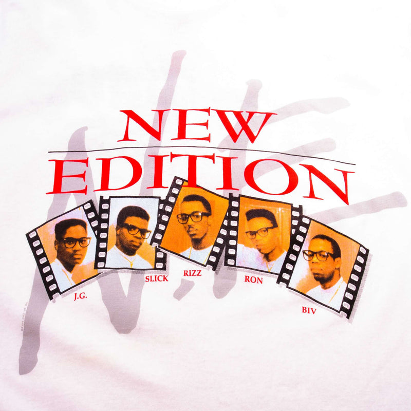 Vintage New Edition Heatwave 1989 With Ronnie DeVoe, Bobby Brown, Ricky Bell, and Michael Bivins Tee Shirt Size Medium Made In USA With Single Stitch Sleeves.