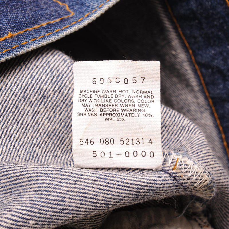 Beautiful Indigo Levis 501 Jeans 1988-1993 Made in USA with a dark blue wash and a nice contrast of dark and medium blue.  Size on Tag X  ACTUAL SIZE 30X29  Back Button #546