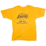 Vintage NBA Los Angeles Lakers Tee Shirt 1982 Size Medium Made In USA with single stitch sleeves. YELLOW