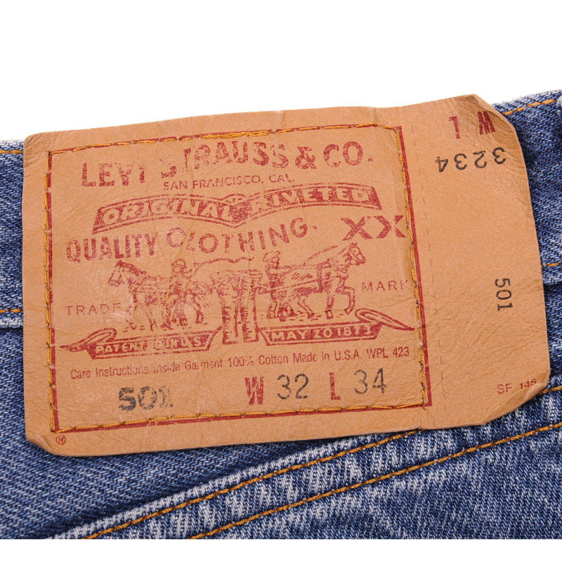 Beautiful Indigo Levis 501 Jeans Made in USA with a medium blue wash and some nice contrast between light and medium blue.  Size on Tag 32X34  ACTUAL SIZE 32X34  Back Button #524A